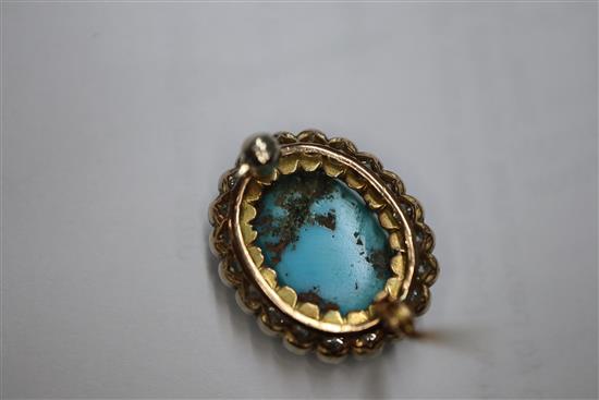 A Victorian yellow metal brooch, with oval turquoise cabochon surrounded by old-cut diamonds, 23mm.